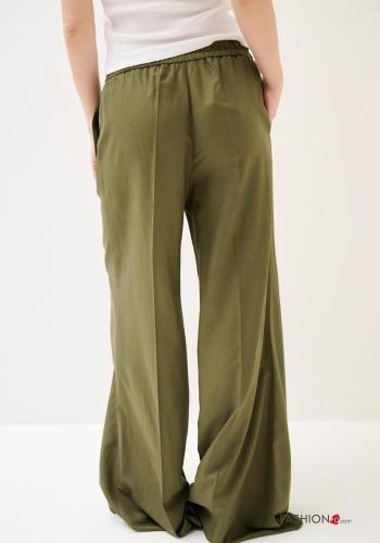 Calças em Linho cintura descida wide leg longo com elástico com fecho com bolsos com botões - ph 4