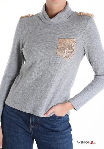 Maglietta a manica lunga a collo alto con paillettes con tasche