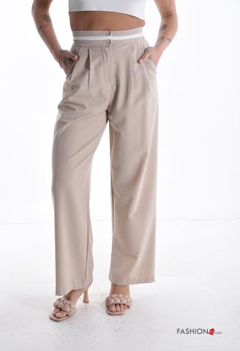 Pantalone vita alta con tasche con bottoni con zip