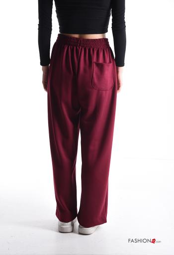 Pantalone sportivo a zampa con tasche con elastico - ph 2