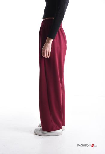 Pantalone sportivo a zampa con tasche con elastico - ph 3