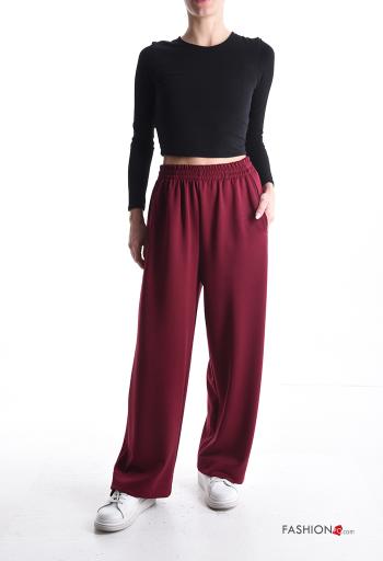 Pantalone sportivo a zampa con tasche con elastico - ph 5