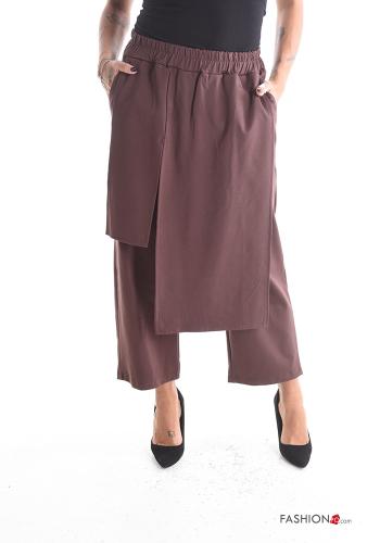 Pantalone asimmetrico con tasche con elastico