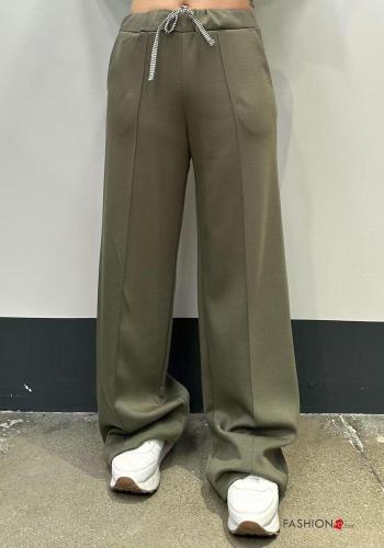 Pantalone sportivo regolabile con tasche con elastico - ph 1