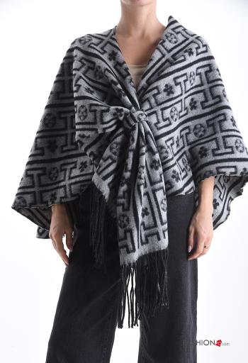 Poncho with fringe with knot