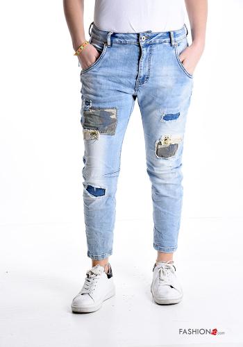 Jeans in Cotone vita bassa strappati con tasche - ph 1