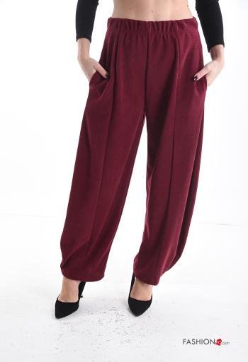 Calças wide leg com bolsos com elástico