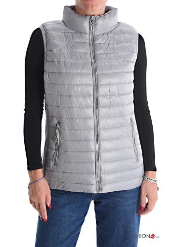 Chaleco acolchado con bolsillos con cremallera de cuello alto