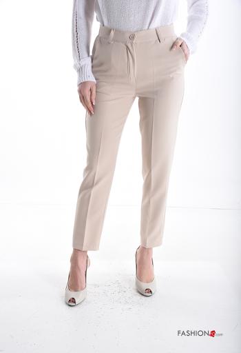 Pantalones skinny con bolsillos con cremallera con botones