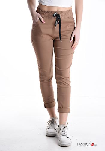 Trousers with pockets with elastic with bow