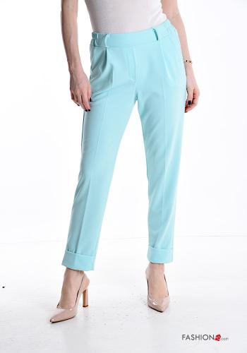 Trousers with pockets with elastic