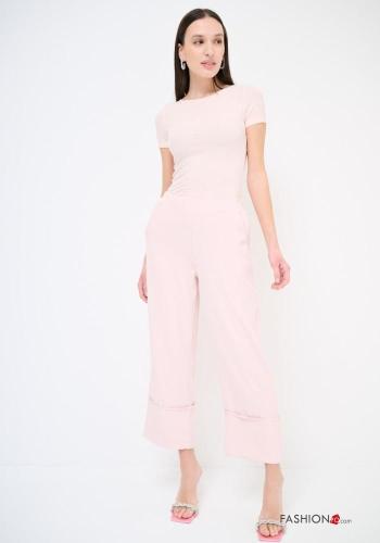 Trousers with pockets with elastic