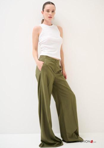 Calças em Linho cintura descida wide leg longo com elástico com fecho com bolsos com botões