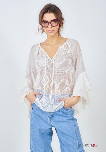 Blouse manches à volant à broderie à col roulé manches à trois-quarts